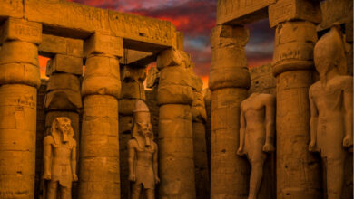 a wonderful view of a group of statues inside one of the ancient egyptian temples egypt736955577